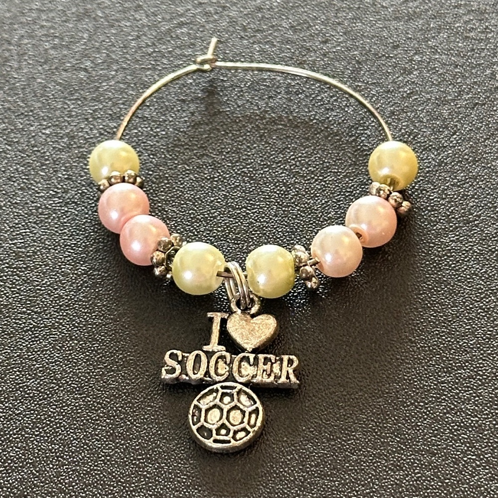 Wine glass tag, stainless steel hoop, yellow/pink beads, soccer charm
